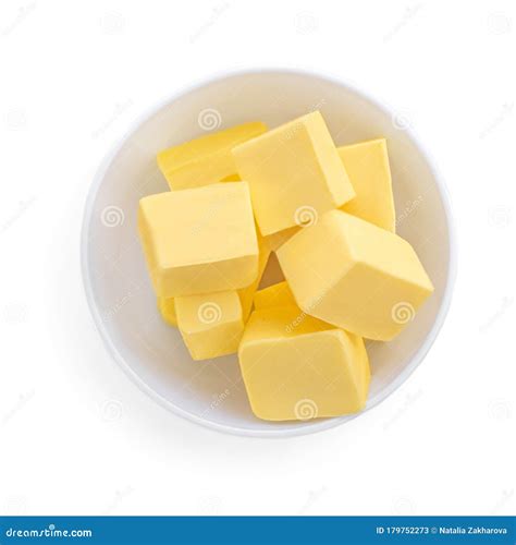 Butter Pieces In Bowl Isolated On White Background Top View Fresh