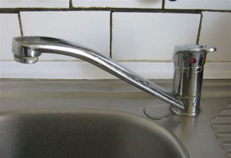 A filtration system is installed below it, under the sink. Kitchen Sink Faucet Leaking at Base: Diagnostics and ...