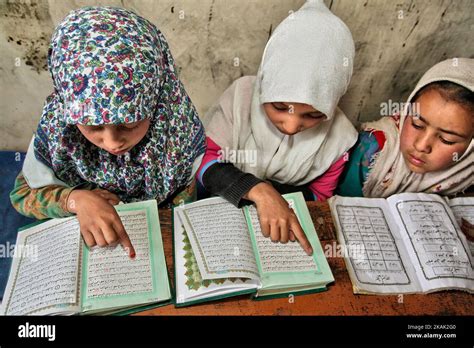 Muslim Children Study The Quran At A Madrassa Islamic Religious School