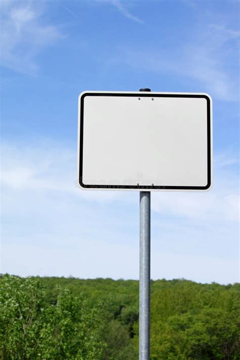 Road Sign With Green Grass And Blue Sky Stock Image Image Of Blank