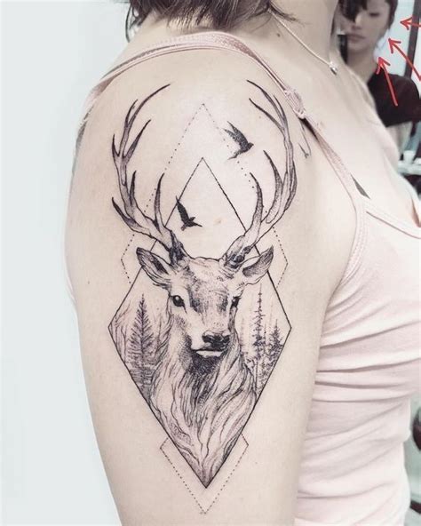 A Woman With A Deer Tattoo On Her Shoulder