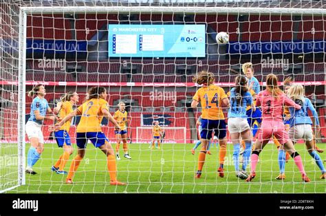 manchester city s sam mewis third right scores her side s first goal of the game during the