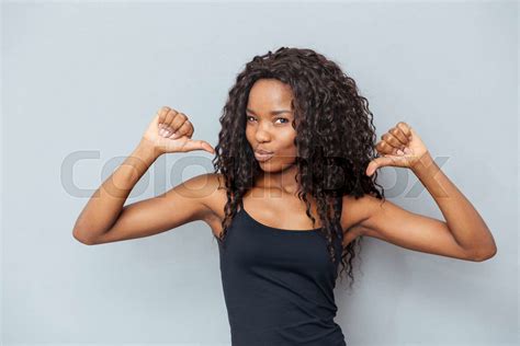Afro American Woman Showing Fingers At Herself Stock Image Colourbox
