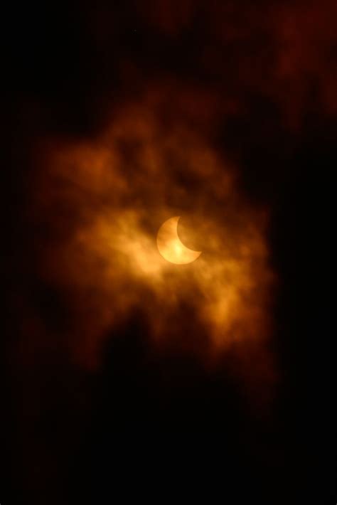 0ce4n G0d Solar Eclipse Through The Clouds Thomas Robitaille