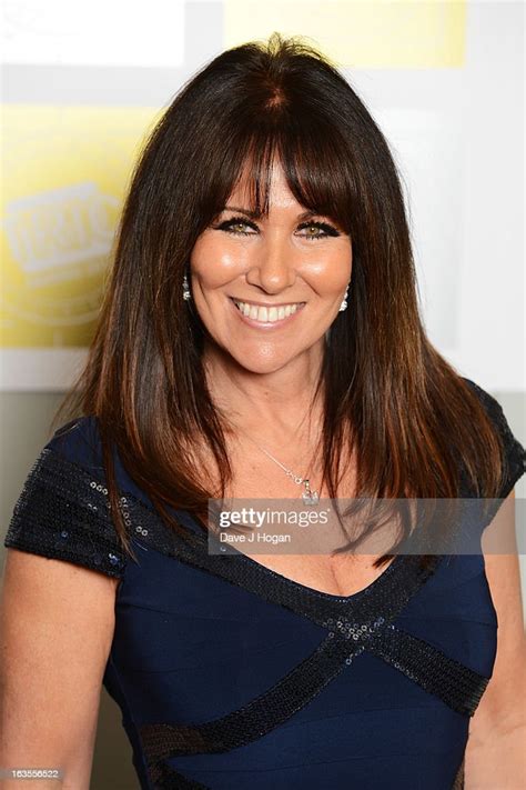 Linda Lusardi Poses In Front Of The Winners Boards At The Tric Awards