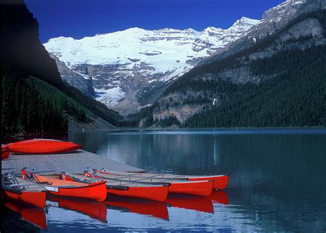 Red Canoes At Lake Louise Photograph By Bruce Beck Fine Art America