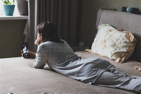 Girl Using Mobile Phone Woman With Smartphone Woman Chatting By Phone On Sofa Social Chat