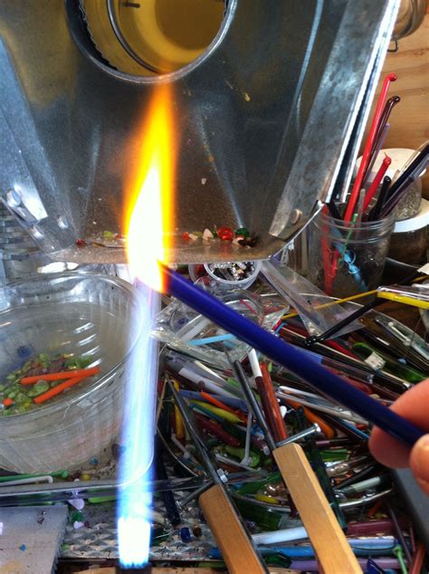 Here I Am I M Melting A Rod Of Glass In The Torch Flame Melting Glass Handmade Lampwork Bead