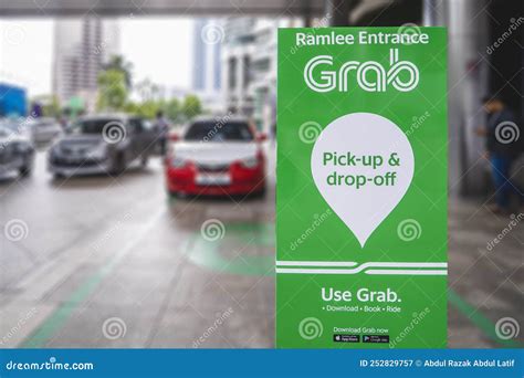 An E Hailing Company Logo Grab Car Display Stand For Pick Up And Drop