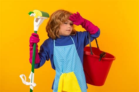 Premium Photo Child Use Duster And Gloves For Cleaning Funny Child