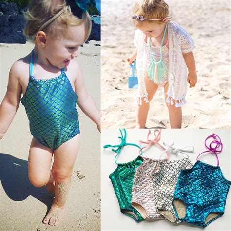 Most baby swimsuits won't have a swim diaper built into the fabric, which leads to extra bulk from wearing both a swim diaper and a swimsuit, plus it's just one more piece of clothing to remember on your way to the pool. High quality Kids Baby Girl Mermaid Bikini One Piece Suits ...