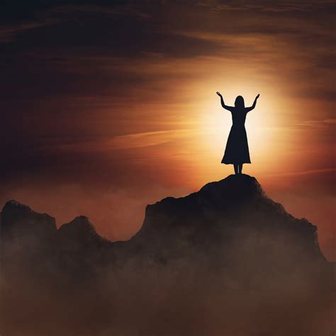 Woman On Mountain In Praise And Worship Royalty Free Stock Image