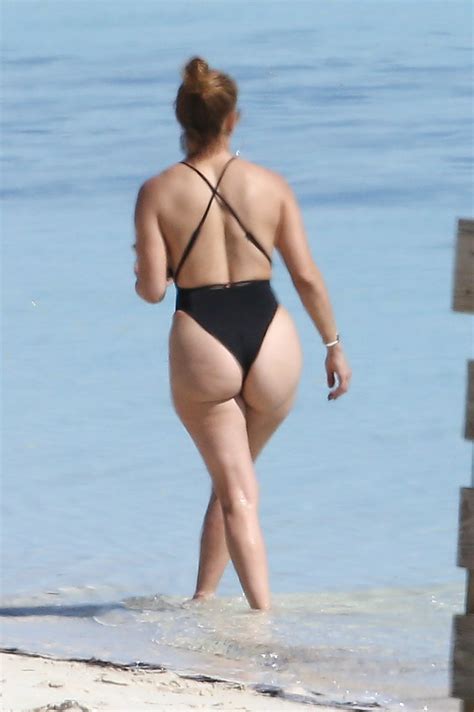 Jlo 51 Shows Off Her Famous Butt In A Black Thong Swimsuit As She