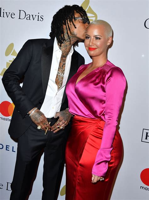 amber rose and wiz khalifa pack on pda at pre grammys party — see the pics