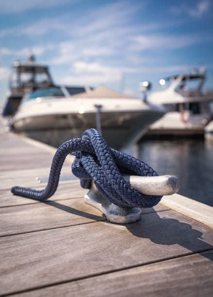 Boat Tied To Dock Stock Photos Pictures And Royalty Free Images Istock
