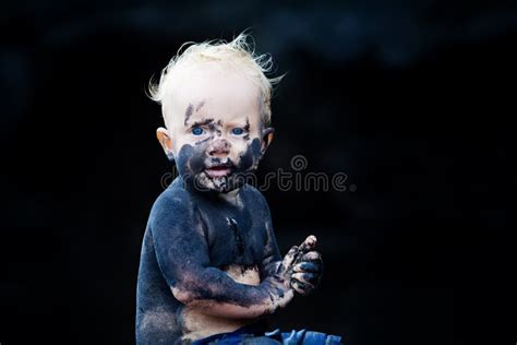 Happy Dirty Child Having Fun On Black Sand Beach Stock Photo Image Of