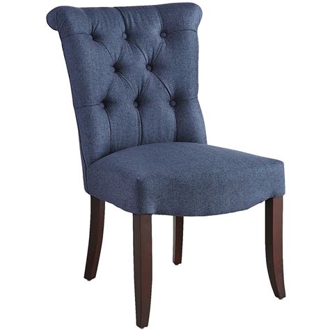 Sleek blue velvet fabric upholstery feels exceptionally soft to the touch and complements the striking goldtone finish on the base. Colette Navy Dining Chair | Pier 1 Imports | Dining chairs ...