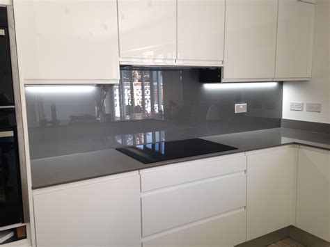 Painted Glass Splashback In Grey Contrasting With The Kitchen Units