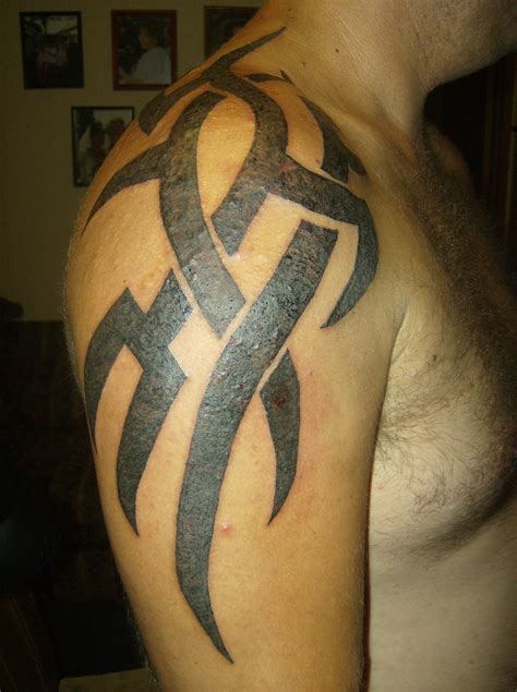 Tribal shoulder tattoos for women. 69 Traditional Tribal Shoulder Tattoos