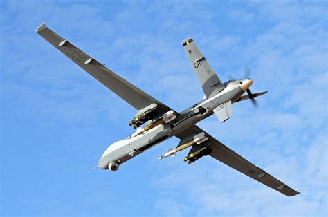 mq 9 reaper armed with paveways and hellfires with images military drone aircraft drone