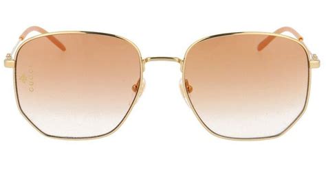 gucci hexagon frame sunglasses in gold metallic lyst