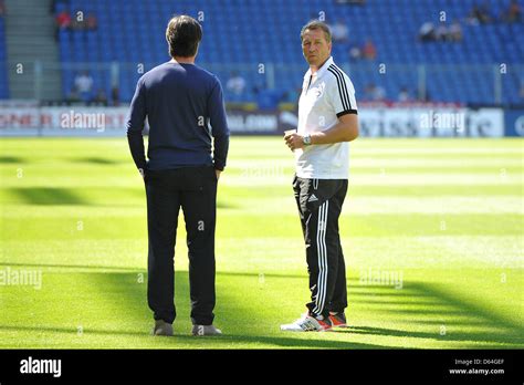 the coach of the german national soccer team joachim loew l and goalkeeper coach andreas
