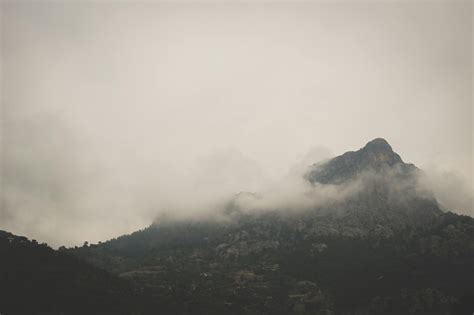 Cloud Covered Mountain Top On Foggy Day · Free Stock Photo