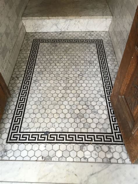 Add a rustic touch to your home with a terracotta floor. Black and white marble floor tile Greek key border ...