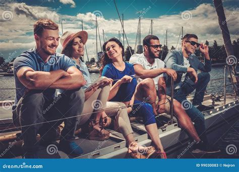 Happy Friends Resting On A Yacht Stock Image Image Of Fashion Chat