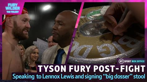 tyson fury signs infamous big dosser stool after being congratulated by lennox lewis youtube