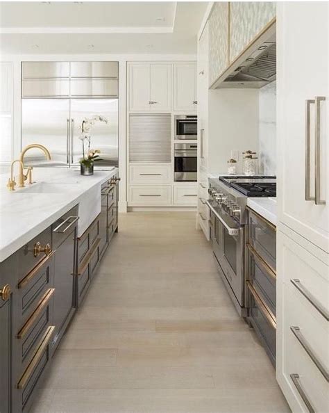 Neutrals, like white, beige and gray, work well for a clean, understated modern look—or you can create something funky and eclectic with stripes or an unusual color trim. Full height cabinetry either side of range- for pantry ...
