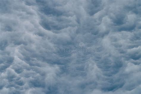 Dramatic Clouds That Look Like Storm Waves In The Ocean Stock Photo
