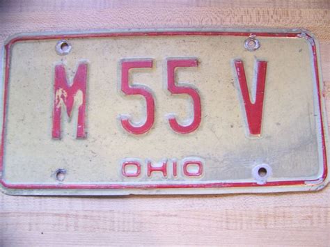 Passenger plates will begin at fwa 1000. Vintage 1970's Ohio License Plate 3D red & white M55V ...