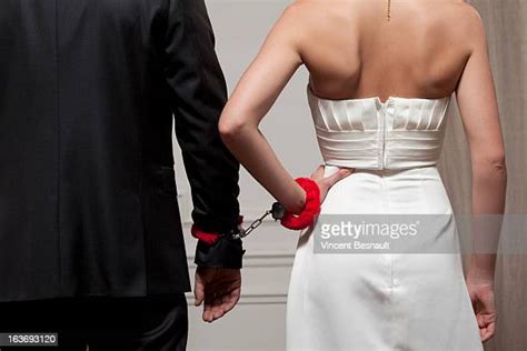 Handcuffs Behind Back Photos Et Images De Collection Getty Images