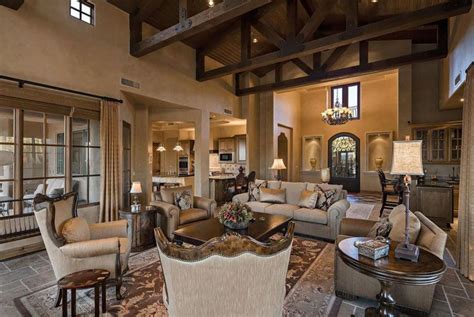 Richly Furnished Living Room With High Vaulted Ceiling And Open Beams