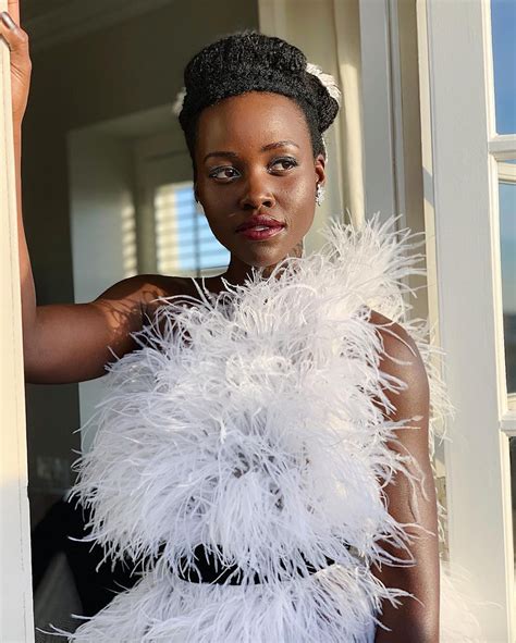 Lupita Amondi Nyongo Black Is Beautiful Beautiful People Feather Gown Bold Makeup Looks