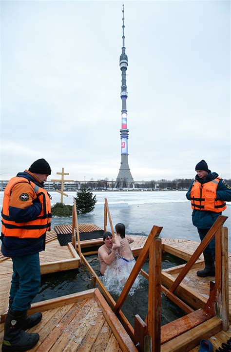 Russian Orthodox Christians Plunge Into Icy Rivers And Lakes To