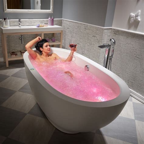 Soak In And Relax With This Freestanding Oval Bathtub With Solid Surface For More Freestanding
