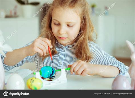 Cute Little Blonde Girl Painting Easter Eggs Stock Photo By