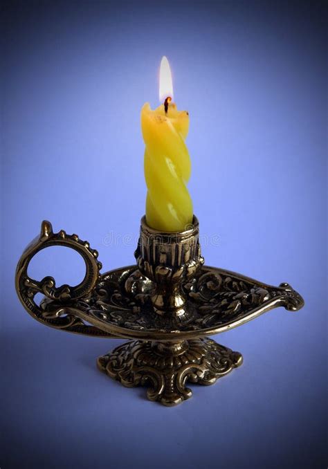 Bronze Candlestick With Burning Candle Stock Photo Image Of Aged