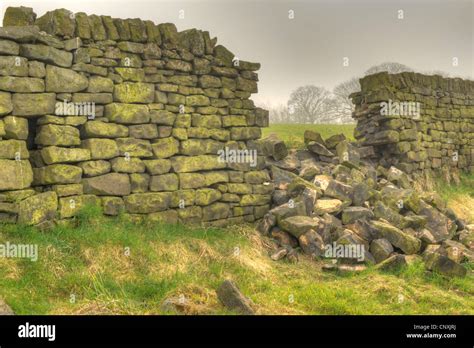 A Collapsed Dry Stone Wall Stock Photo Alamy