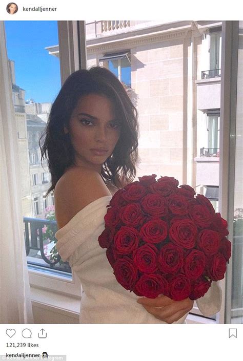 Kendall Jenner Flashed A Bare Shoulder As She Poses With The Two Dozen