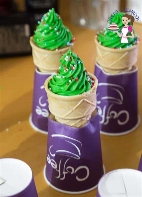 Cones with batter using an ice cream scooper , so that all the cones can have an equal amount. Ice Cream Cone Christmas Tree Cupcakes - Veena Azmanov