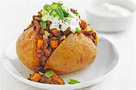 Jacket Potatoes With Curried Beef And Raita