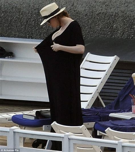 Christina Hendricks Causes A Lake Como Tion In Black Swimsuit As She