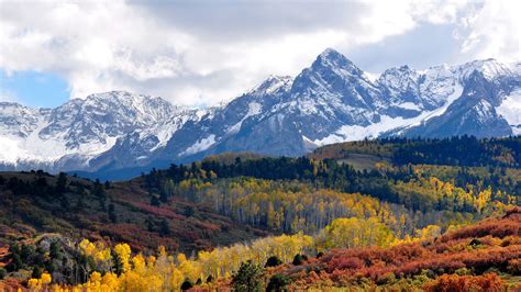 Landscape View Of White Snow Covered Mountains Yellow Red Green Leafed