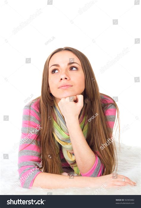 Portrait Of Attractive Teenage Girl Think Looking Up Stock Photo
