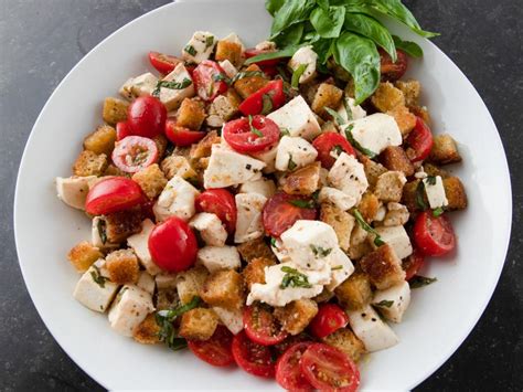Tomato bruschetta is one of those gems that proves you can make incredible food in minutes with a few simple, great quality ingredients. Tuscan Tomato & Bread Salad Recipe | Ina Garten | Food Network