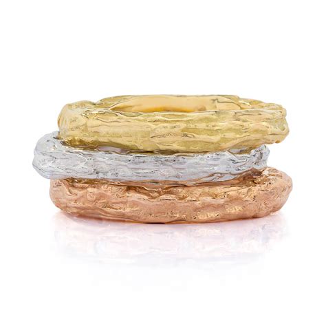 Banyan golf club features deep green paspalum grassed tee boxes each with four tee distances that deliver a range of challenging play to suit every golfer's ability. Banyan Tree Gold Stackable Ring - Farlang