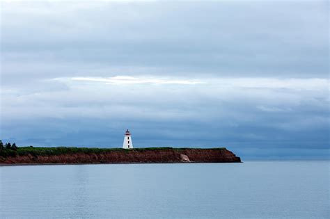 Lonely Lighthouse Photograph By Stclair Macaulay Fine Art America